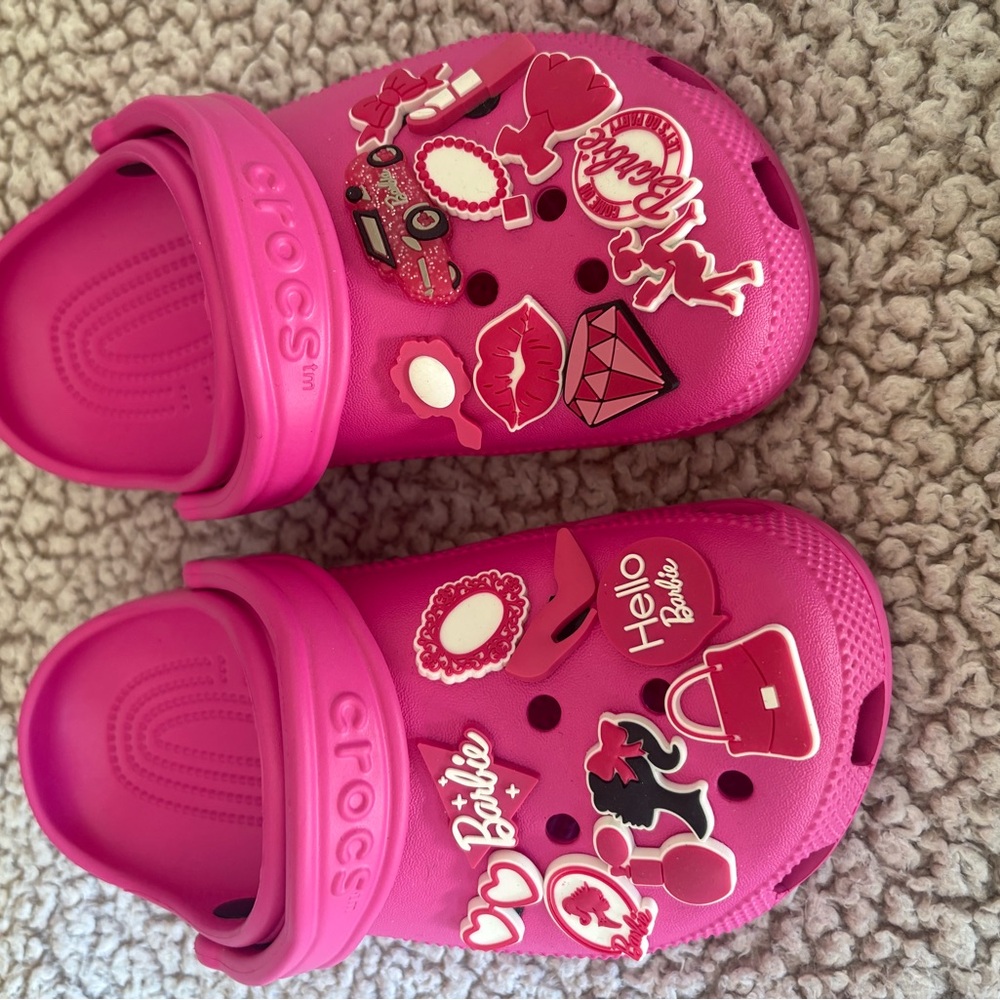 Crocs woman’s  Pink Clogs with Fun Graphics